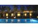 Inviting pool area at night with ambient lighting and private cabanas for relaxation and entertainment at 4471 Dean Martin Dr # 1105, Las Vegas, NV 89103
