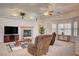 Living room with a fireplace and built-in shelving, with views of the front yard at 4681 Melissa Ln, Pahrump, NV 89048