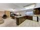 Spacious open floor plan with a kitchen and living area at 4768 W Montara Cir, Las Vegas, NV 89121