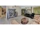 Bright living room with neutral carpet, shelving and vintage decor at 4768 W Montara Cir, Las Vegas, NV 89121