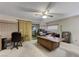 Office featuring neutral carpet, ceiling fan and sliding door to outdoors at 4768 W Montara Cir, Las Vegas, NV 89121