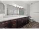 Bathroom featuring wood-look flooring, a quartz countertop, and glass enclosed shower at 50 White Burch Ln, Pahrump, NV 89048