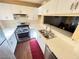 This modern kitchen features white cabinets, stainless steel appliances, a gas stove, and plenty of counter space at 5000 Red Rock St # 228, Las Vegas, NV 89118