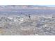 Aerial view of the property with the Las Vegas Strip skyline in the background at 5168 Wilbur St, Las Vegas, NV 89119