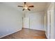 Spacious bedroom features wood floors, a ceiling fan, and neutral paint, creating a welcoming atmosphere at 5250 S Rainbow Blvd # 2120, Las Vegas, NV 89118