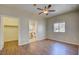 Spacious main bedroom featuring hardwood floors and ample closet space at 5250 S Rainbow Blvd # 2120, Las Vegas, NV 89118