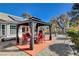 Gazebo with outdoor dining set and mature landscaping at 5301 Singing Hills Dr, Las Vegas, NV 89130