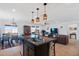 Kitchen island overlooking the living area, ideal for casual dining and entertaining guests at 550 Dawson Falls Ave, Indian Springs, NV 89018