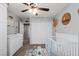 Bright Bedroom with crib, dresser, and colorful decor, perfect for a baby's room at 7017 Pink Flamingos Pl, North Las Vegas, NV 89084