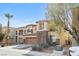 Charming two-story home with a two-car garage and a well-maintained front yard at 7017 Pink Flamingos Pl, North Las Vegas, NV 89084