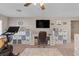 Spacious office area with a large desk setup and an abundance of storage, creating an organized workspace at 7017 Pink Flamingos Pl, North Las Vegas, NV 89084
