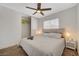 Serene bedroom with carpet flooring, a ceiling fan, and a large closet for ample storage at 7285 Pinebrook Cir, Las Vegas, NV 89147