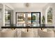 Dining room featuring an outdoor view of a pool through sliding glass doors at 74 Innisbrook Ave, Las Vegas, NV 89113