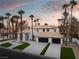 Stunning home featuring a two-car garage, beautiful landscaping, and a neutral color palette at 74 Innisbrook Ave, Las Vegas, NV 89113