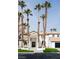 Charming home with a classic design, accentuated by lush palm trees and inviting curb appeal at 74 Innisbrook Ave, Las Vegas, NV 89113