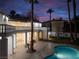 Balcony view of a home with a pool and landscaping showcasing the outdoor living space at 74 Innisbrook Ave, Las Vegas, NV 89113