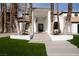 Stunning front entrance with palm trees and a clean, modern design at 74 Innisbrook Ave, Las Vegas, NV 89113