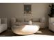 Comfortable living room featuring a modern sofa and artistic accents at 74 Innisbrook Ave, Las Vegas, NV 89113