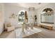 Bright home office with arch windows, modern chandelier and neutral tones at 74 Innisbrook Ave, Las Vegas, NV 89113
