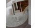 Close-up view of a grand piano on a plush, white rug at 74 Innisbrook Ave, Las Vegas, NV 89113