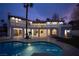 Beautifully designed backyard with a pool, ideal for leisure and outdoor gatherings and relaxation at 74 Innisbrook Ave, Las Vegas, NV 89113