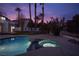 Cozy backyard featuring a pool and hot tub, creating a tranquil and private oasis at 74 Innisbrook Ave, Las Vegas, NV 89113