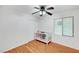 This bedroom has wood floors and a crib at 7873 Marbledoe St, Las Vegas, NV 89149