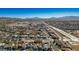 Stunning aerial view of the neighborhood with beautiful mountain views in the distance at 816 Sandsprings St, Henderson, NV 89011