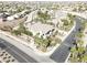 Expansive aerial view of a large house in a neighborhood, boasting lush landscaping and a prime location at 861 Majestic Ridge Ct, Henderson, NV 89052