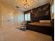 Bedroom featuring a stylish bed, two closets, area rug, and two windows with shutters at 861 Majestic Ridge Ct, Henderson, NV 89052