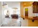 Spacious dining room with chandelier is located near kitchen and butler's pantry at 861 Majestic Ridge Ct, Henderson, NV 89052