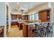 Large kitchen with stainless appliances, granite countertops, and bar stool seating at 861 Majestic Ridge Ct, Henderson, NV 89052