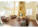 Bright and airy living room with large windows, fireplace, and comfortable seating at 861 Majestic Ridge Ct, Henderson, NV 89052
