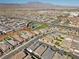 An aerial view of a well-planned suburban community with mountain views at 8705 Fordster St, Las Vegas, NV 89166