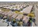 Panoramic aerial view of a community with multiple houses and tree-lined streets at 9171 Denver Sky Ave, Las Vegas, NV 89149