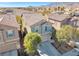 Aerial view of a house with a well-manicured front yard in a residential neighborhood at 9171 Denver Sky Ave, Las Vegas, NV 89149