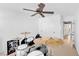 This bedroom has plenty of space with drum set and closet at 9171 Denver Sky Ave, Las Vegas, NV 89149