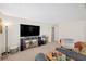 Bright Bonus Room area features a TV and additional seating options at 9171 Denver Sky Ave, Las Vegas, NV 89149