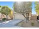 Charming two-story home featuring a well-manicured front yard and a two-car garage at 9171 Denver Sky Ave, Las Vegas, NV 89149