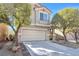 Charming two-story home with a well-manicured front yard and an attached two-car garage at 9171 Denver Sky Ave, Las Vegas, NV 89149