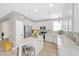 Bright kitchen features a center island, stainless steel appliances, and white cabinets at 9171 Denver Sky Ave, Las Vegas, NV 89149