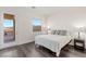 Bedroom with hardwood floors and private patio access, filling the room with natural light at 924 Mayfield Manor Ln, Las Vegas, NV 89138