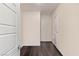 Hallway features sleek hardwood floors and modern white doors at 924 Mayfield Manor Ln, Las Vegas, NV 89138