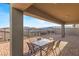 Covered patio boasts a dining area and views of the surrounding mountains at 924 Mayfield Manor Ln, Las Vegas, NV 89138