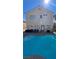 Backyard featuring a pool and lounge area ideal for outdoor enjoyment at 9328 Jumpin Juniper Ave, Las Vegas, NV 89129