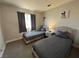 This bedroom has twin beds, closet and modern decorations at 9328 Jumpin Juniper Ave, Las Vegas, NV 89129