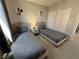 Bedroom features twin beds and modern art and is brightly lit at 9328 Jumpin Juniper Ave, Las Vegas, NV 89129