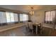 Bright dining room with updated lighting and a neutral color scheme at 9328 Jumpin Juniper Ave, Las Vegas, NV 89129