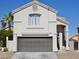 Charming two-story home with a well-maintained front yard and attached two-car garage at 9328 Jumpin Juniper Ave, Las Vegas, NV 89129