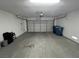 A clean two-car garage offering plenty of space for parking and storage solutions at 9328 Jumpin Juniper Ave, Las Vegas, NV 89129